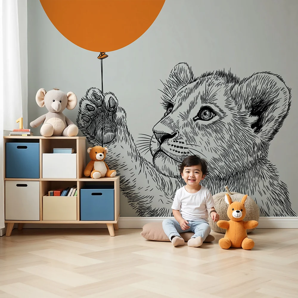Barnetapet med liten løve og oransje ballong