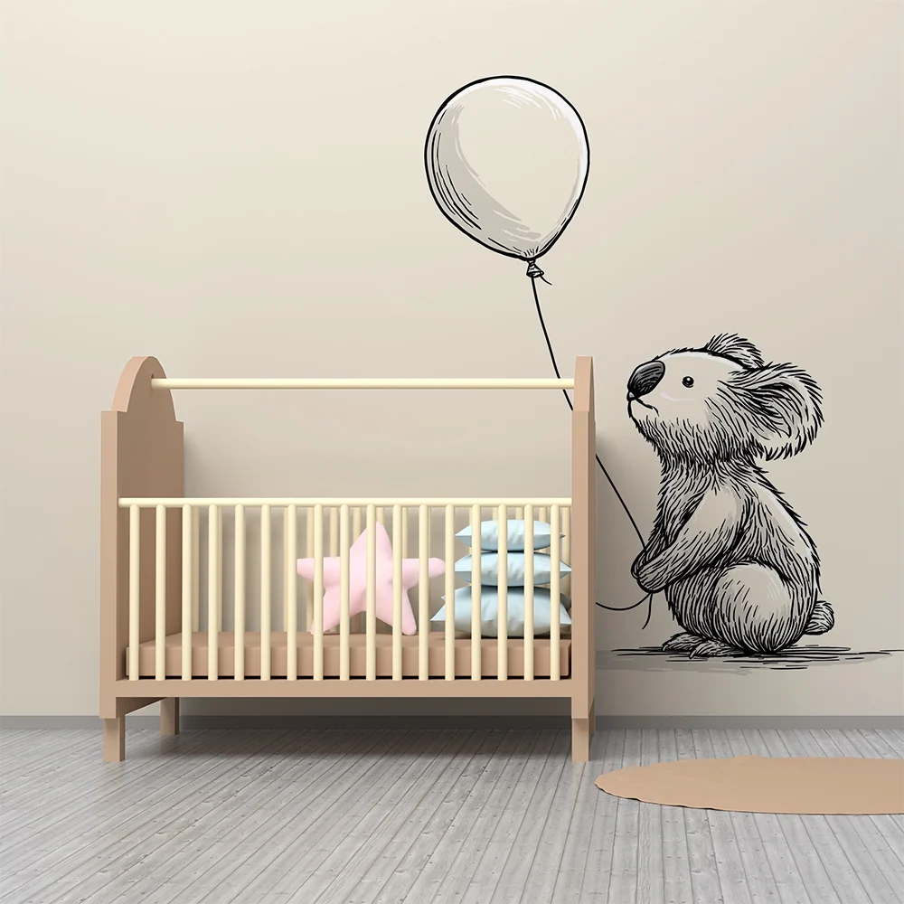 Tapet barnerom | Liten koala som holder en ballong i en myk setting